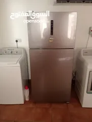  1 refrigerator and laundry machine