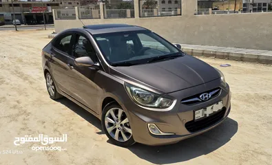  1 للبيع أكسنت 2014 فل مع فتحة أعلى صنف بسعر ممتاز