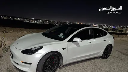  4 تسلا موديل 3 لون أبيض لؤلؤي 2022 Tesla model 3 . 2022
