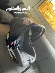  2 كوت للاطفال وكارسيت  (car seet) بنشبك بالسيارة ماركة   (Graco) sungride بسعر مغري جدا بحالة الجديد