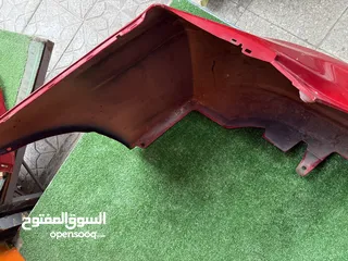  13 طمبون خلفي تويوتا بريوس 2010-2015  اصلي مستعمل بحالة جيده موضح بصور  Toyota Prius ياباني2010-2015