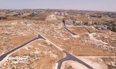  9 ارض للبيع 940 م تنظيم سكن ( أ )  تقع على شارعين طريق المطار_  ناعور حسبان _ من المالك مباشرة
