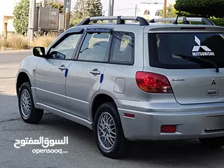  16 ميتسوبيشي آوتلاندر اوتوماتيك 2003 توب نظافة بسعرررر مميززز محرك 2400cc