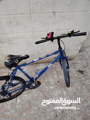  1 بسكليت مستعمل بحالة الجديد نوع ياباني كلشي شغال معاه بيجي مكان لمطرة المي و ستاند تلفون و كرسي جديد.