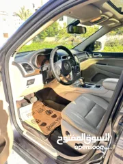  12 جراند شوروكي 2016 محرك بنزين بقوه 3600cc جير اوتوماتيكي مكون من 8 سرعات نظام دفع رباعي امريكي مميز