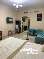  9 For rent in Ajman, studio in Al Yasmeen Towers, opposite Ajman City Centre, new furniture, easy exit