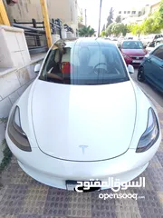  20 تيسلا 3 موديل 2023 كلين تايتل بحالة الوكالة لون ابيض وغرفة ابيض