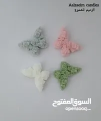  2 شموع وتوزيعات شموع معطرة