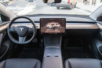  23 تيسلا model 3  tesla 2023 ستاندر  فحص كامل بحاله الوكاله  لون فيراني