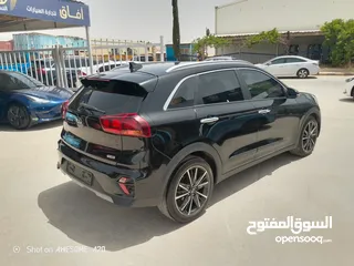  8 كيا نيرو هايبرد 2021 فحص 7جيد لون اسود مميزه للبيع مجمرك أو بدون جمرك للإعفاءات من المستورد مباشره