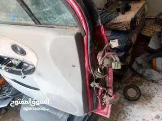  14 اربع ابواب وغطا امامي وغطا خلفي لشيري QQ 2006