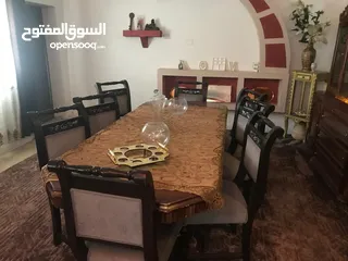  8 كنب خشب زان دمياطي وطاولة سفرة مع 8 كراسي