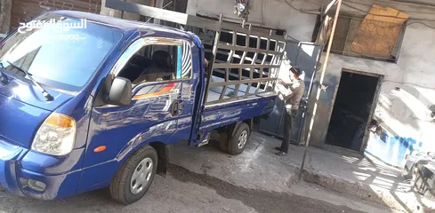  1 كيا بنجو كبينة وربع 2009