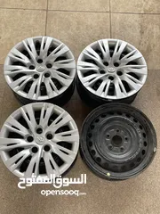  1 جنطات كامري اصلي مع طاسات