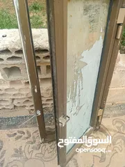  13 ابواب خشب سويد وشبابيك وجاكوزي وابواب حديد للبيع
