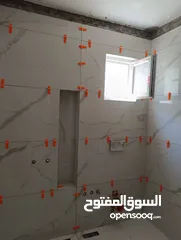  13 كافة اعمال البلاط والبورسلان والشايش والحجر الطبيعي