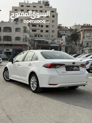  12 تويوتا كارولا ترخيص 2022 محرك 1800 هايبرد جير أوتوماتيك 170 حصان