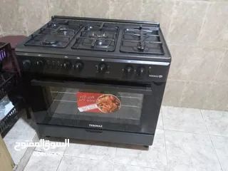  4 فرن تكماز اسود جديد