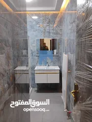  9 شقة أرضية فاخرة للبيع في الجاردنز  - خلف الدستور 155م مع ترس 25م تشطيب سوبر ديلوكس لم تسكن