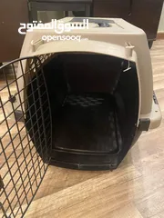  1 Small sized dog crate and travel bag