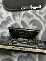  2 Psp اصلي مستعمل مع اربعة سيدي و حافظة اصلية و شنطة اصلية من عام 2000
