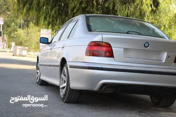  14 BMW e39  520ia