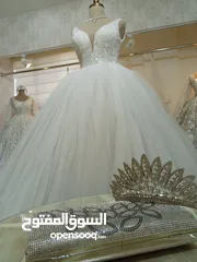  2 محل بدلة أعراس  ابيض خطوبه وجميع المستلزمات العروس داخل المحل للبيع بسعر مغري بضاعه تركيه وجديد  ومس