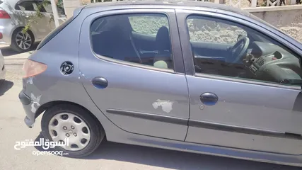  3 بيجو 2007 موديل 206 فحص كوم حديد 1300دينار