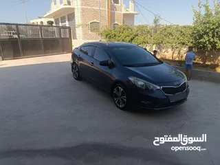  8 كيا سيراتو موديل 2014 ما شاء الله فول اضافات فتحة سقف حساس امامي خلفي شركة ليد امامي وخلفي سبويلرات