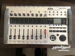  1 Zoom R24 Multitrack Recorder, mixer and drum machine