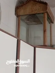  2 حوض سمك 40×40×40 مع كوخ خشبي من نوع خشب سويد مدهون سولر ضد العفن بقعد العمر كله بدون عفن