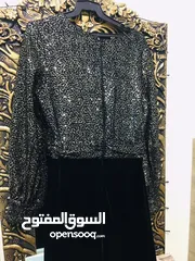  1 فستان ستاتي اسود و فستان زهري محير