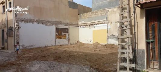  2 ارض في سوق الجمعه خلف سوق المجمع HT