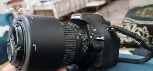  4 كاميرا نيكون D5200 كأنها جديده لم تستعمل عداد الشتر 7k + عدستين (18-55+55-200)