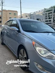  1 هونداي سوناتا هايبرد موديل 2014 مميزة لون ازرق بلو فل اضافات