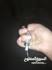  2 عصا سحرية ستانلس ستيل للحركات فقط بتنشد وبتترخا طولها وهي مسكره 5سنتي وهي فاتحه متر و20