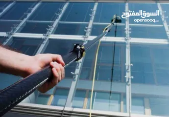  2 تنظيف واجهة المباني زجاجية