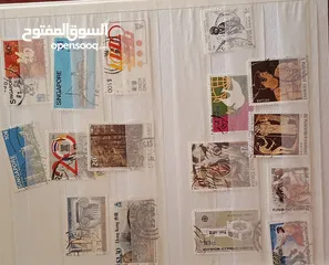  17 طوابع اصلية من كل بلدان العالم للبيع المستعجل الطابع ب دينار
