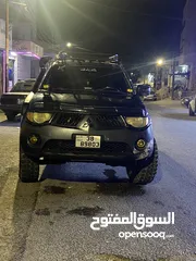  3 بكم متسوبيشي l200  2009 للبيع 4*4