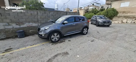  10 جيب كاياسبورتاج موديل 2014-اتومتيك'دفع 4×4 ماتور 2000ديزل فل فل اضافات ماعد الفتحة - نظيف من الاخر