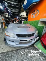  10 Mitsubishi Lancer Evolution 9  وارد اليابان ممشى قليل بحالة ممتازه متوفره كامله