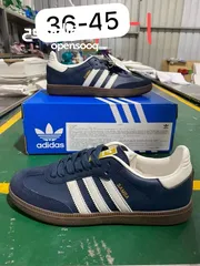  2 Adidas Samba shoes