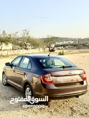  4 سكودا رابيد 1400 تيربو/اصل برايفت جير اتومات فحص ممتاااز سعرر حررق