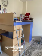  2 kids bed with small coupard
