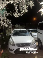  1 فورد فوكس 2006 سيارة مرخصة مأمنة بصلاة عنبي