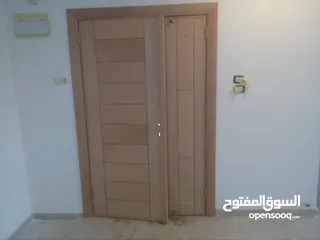  18 عرض على ابواب الخشب
