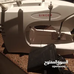  7 ماكينة خياطة سنجر برازيلية بحالة الوكالة