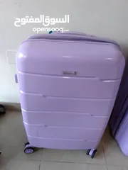  4 purple suitcase used once