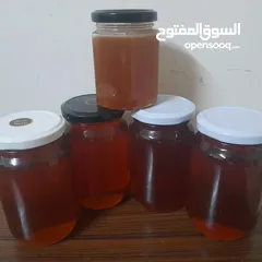  22 عسل طبيعي 100%  العسل الطبيعي الفاخر الابيض القرغيزي والأسود والأحمر وغذاء الملكات