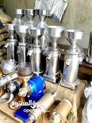  12 ماكنات طحن قهوة بحال الوكالة ، أنواع مختلفه احجام مختلفه ، حجر جديد بحال المصنع -من حجر 8 لحجر 14